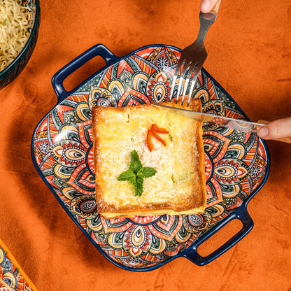 Square ceramic serving tray with floral design and double handles, perfect for any season.