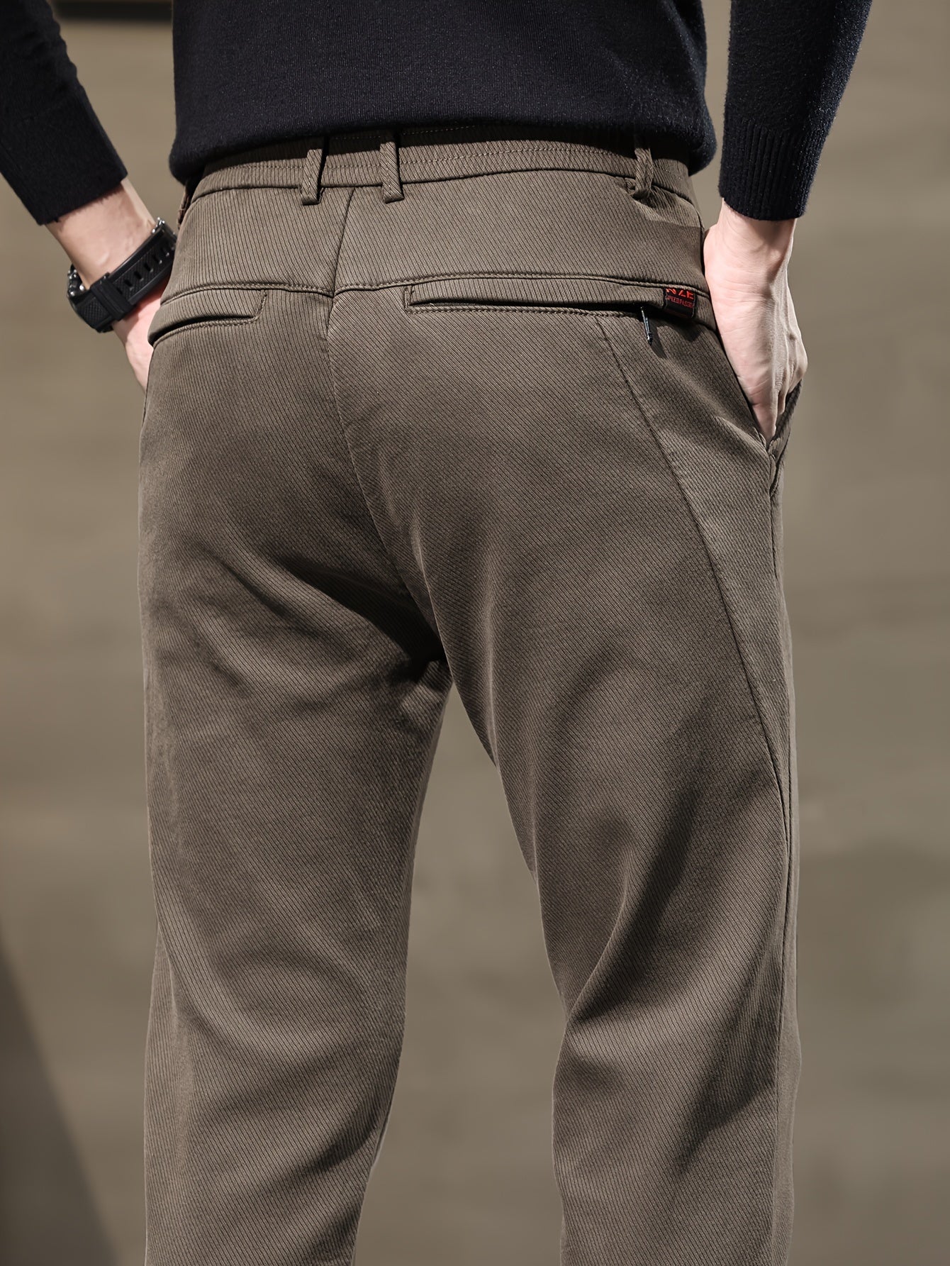 New men's casual pants by a sports brand, perfect for spring and autumn 2023.