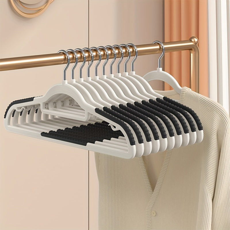 10 non-slip heavy duty clothes hangers for storage and organization in bedroom, bathroom, and home.