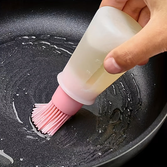 Silicone basting brush with oil dispenser, ideal for BBQ and pastry cooking. Made with food grade organic silicone, perfect for spreading honey, sauce, and for baking. A kitchen essential.