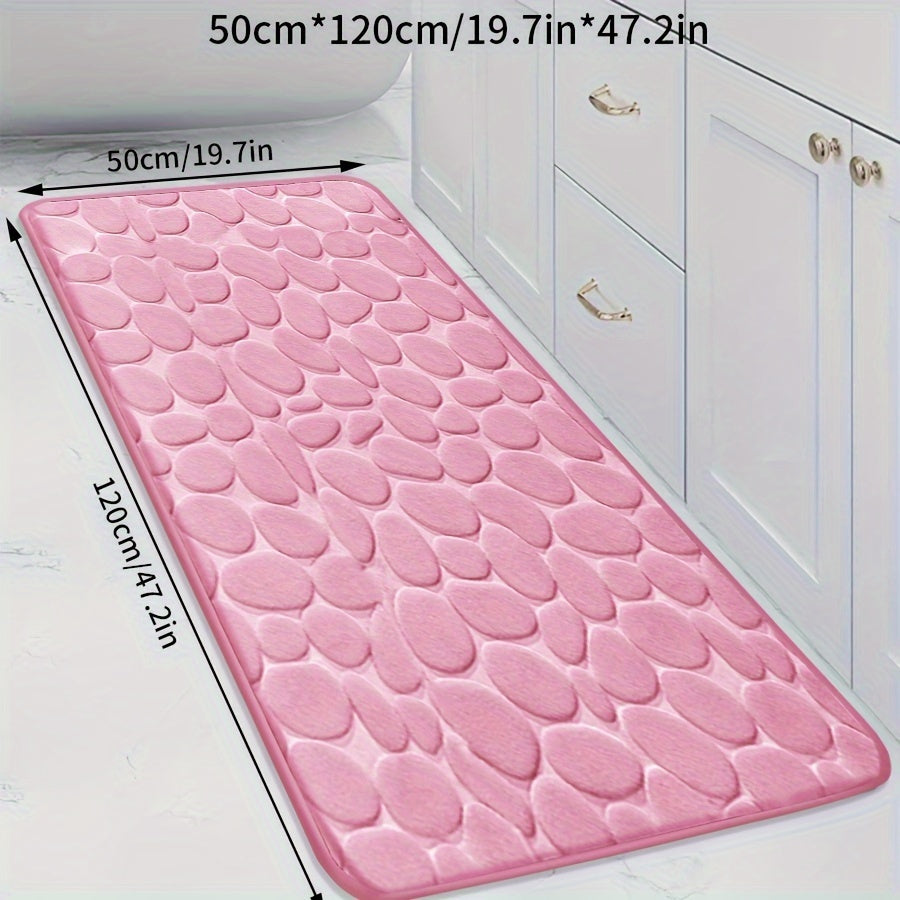 Soft, non-slip coral fleece bathroom mat in a pebble pattern. Quick-dry, machine washable, and low pile for comfort and home decor. Made of plush polyester fiber with knit fabric and 100% polyester material. 570gsm and 1.4cm thick.