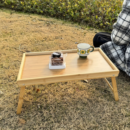 Bamboo folding table with tray, adjustable for bed, sofa, outdoors. Perfect gift for Father's Day and Mother's Day.