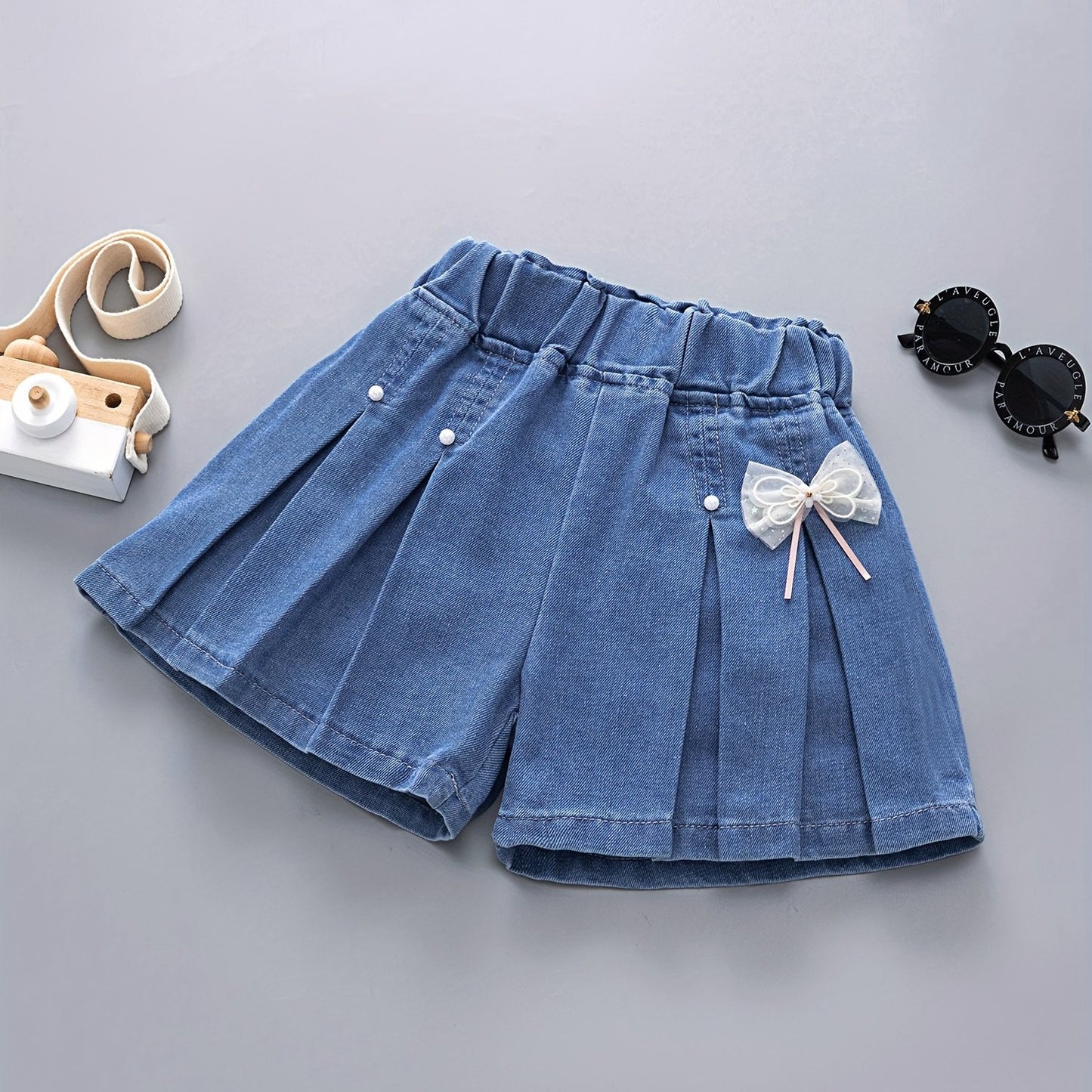 Girls' denim pleated skirt and ruffled shorts for summer, perfect for daily wear or beach holidays with a comfortable and elastic waist.