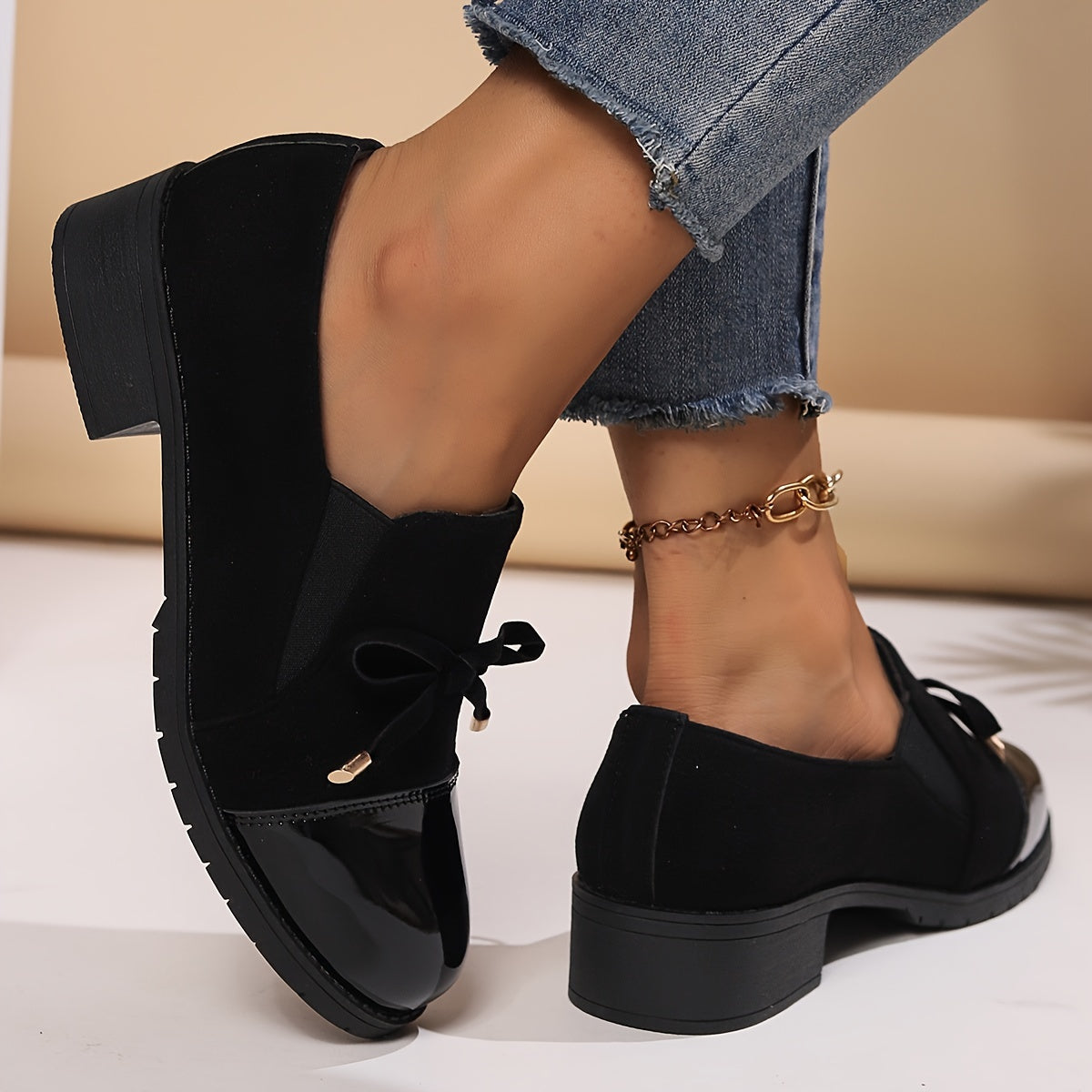 Retro bowknot loafers for women - breathable slip-on casual shoes with chunky heel, black cover upper, all-season comfort. Round toe design and decorative strap detail.