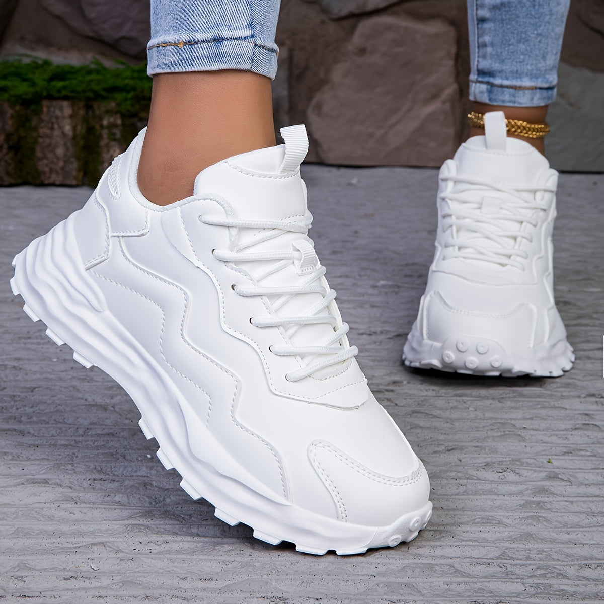 Lightweight women's fashion sneakers with non-slip sole, lace-up design, casual style, and breathable fabric lining.