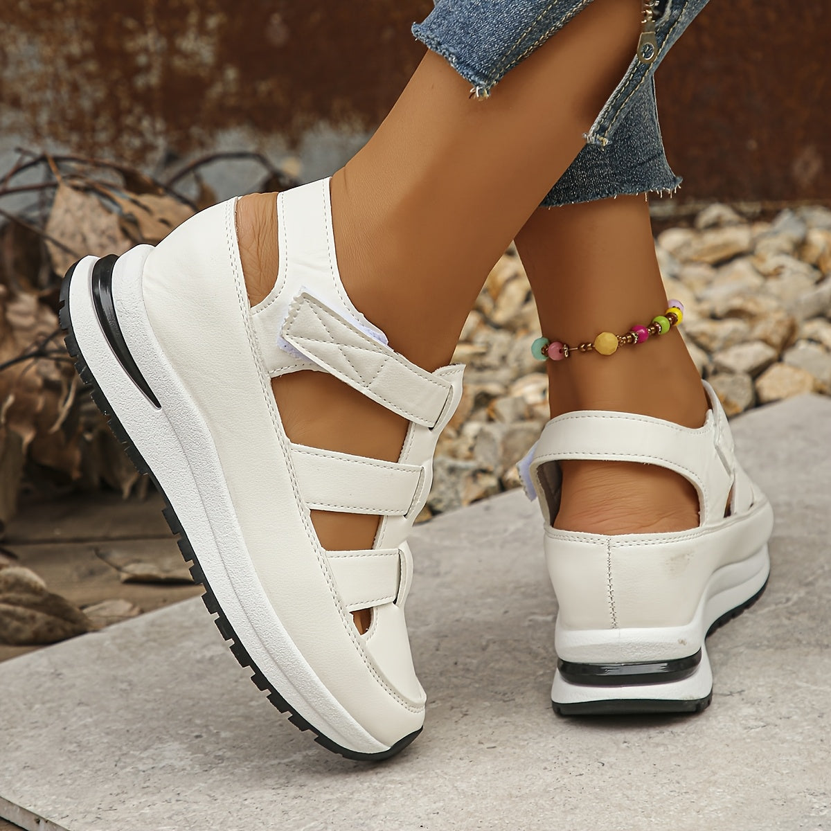 Stylish wedge sandals with hidden height, thick sole and hook-and-loop closure for comfort and versatility.