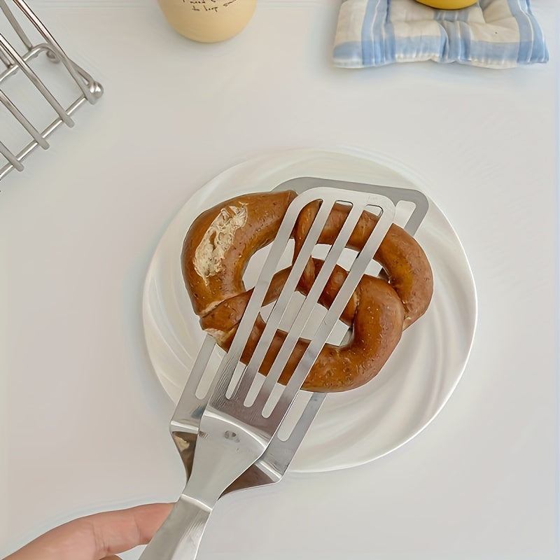 One multifunctional stainless steel serving tong for buffet, fish frying, bread, steak, salad, and dessert - perfect for effortless food prep and presentation.