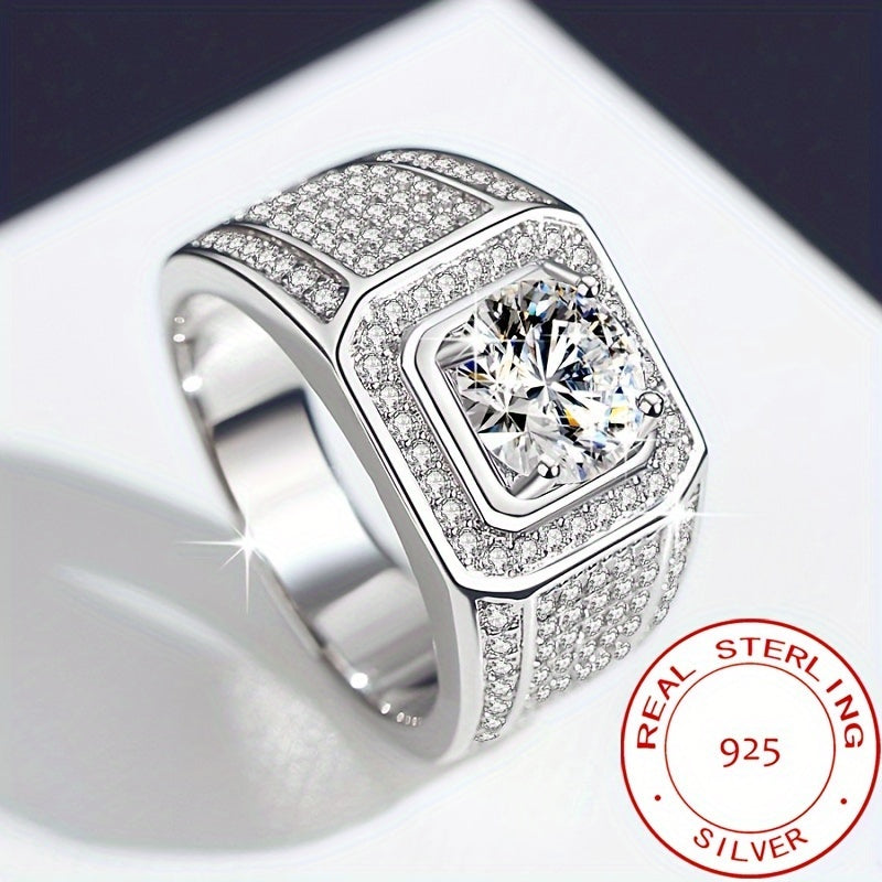 A stunning men's ring crafted with care and precision, featuring a sparkling zirconia set in luxurious 925 sterling silver. This statement piece weighs around 12.3 grams, exuding elegance and dominance.