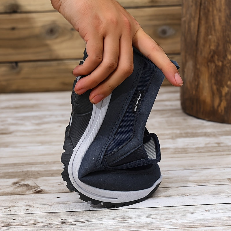 Men's slip-on sports sneakers with breathable fabric upper, round toe, and faux sole for daily wear and running.