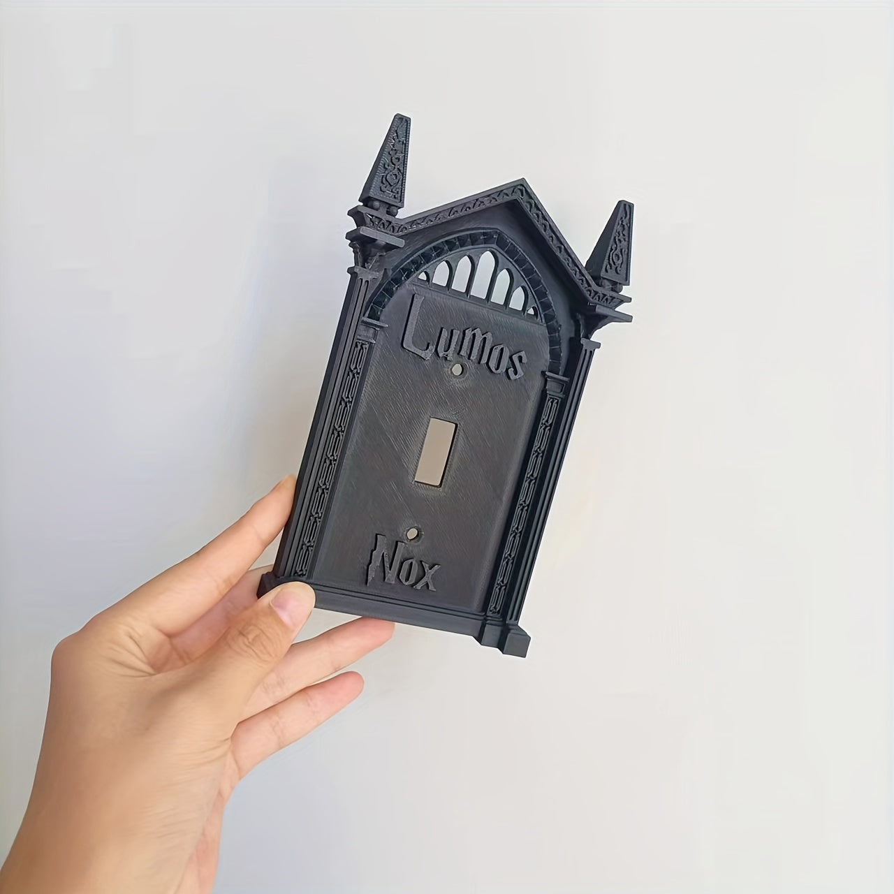 Easy-install 3D printed light switch cover for Halloween and holiday decor; no batteries needed. Unique black wall art for home, Halloween decorations.