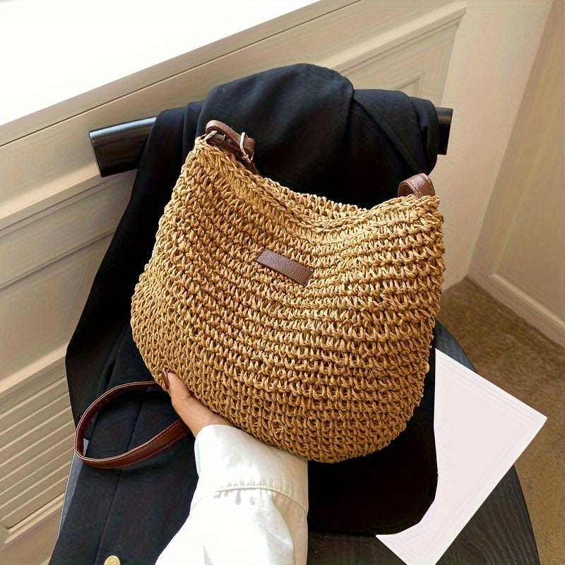 Handmade rattan crossbody bag for women, woven straw shoulder bag for summer.