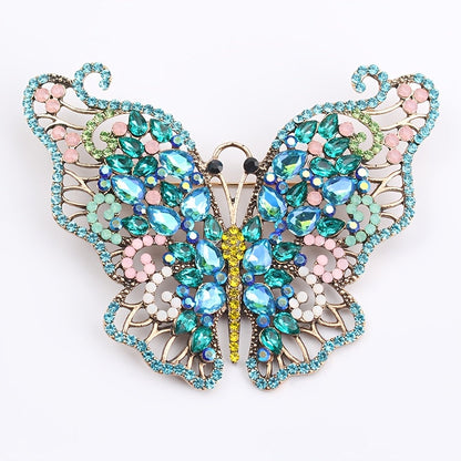 Luxurious Rhinestone Butterfly Brooch Pin adorned with Colorful Crystals, Elegant Fashion Accessory for Women.