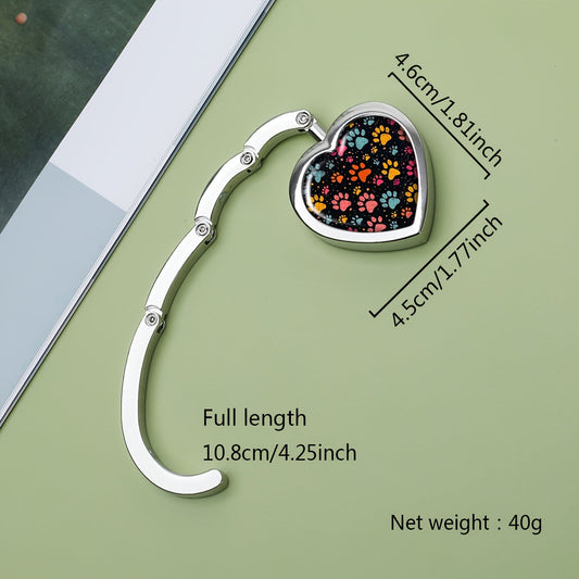 Stylish Foldable Purse Hanger in Heart Shape - Vibrant Paw Print Design, Made of High-Quality Zinc Alloy, Convenient Handbag Hook for Tables