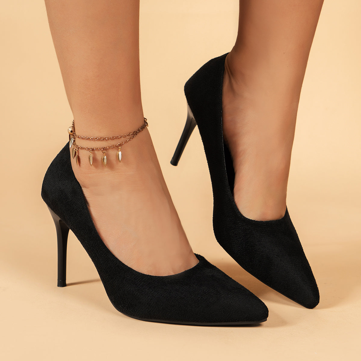 Black slip on stiletto court pumps with pointed toe and versatile style.