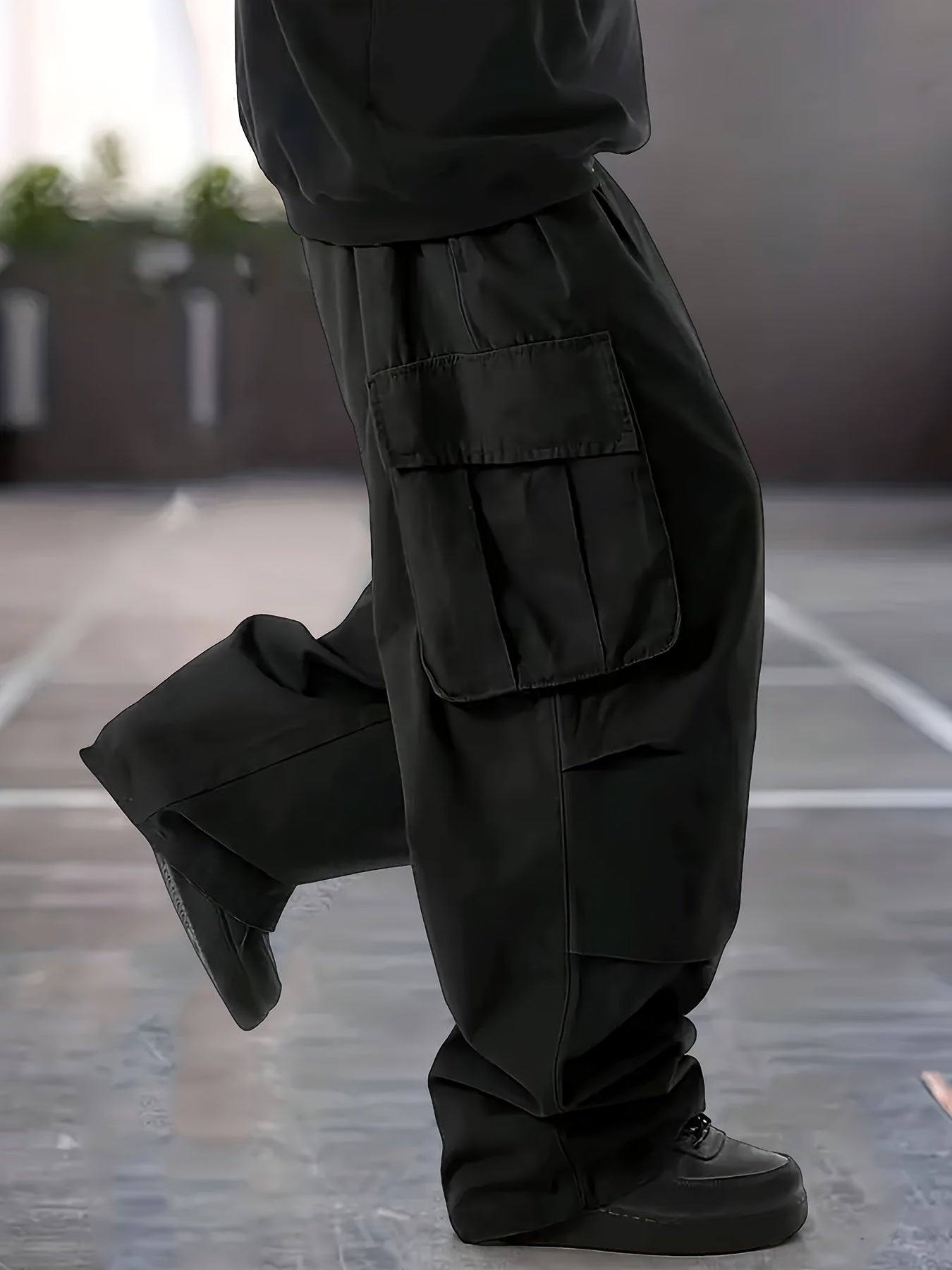 Men's plus size cargo pants made of 100% polyester with multi-pocket design, straight leg fit, and waterproof fabric. Perfect for outdoor activities and travel, available in big and tall