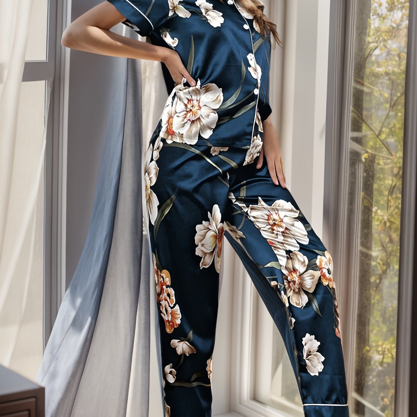 Floral pajama set with short sleeve top and elastic waistband pants for women's sleep and lounge wear.