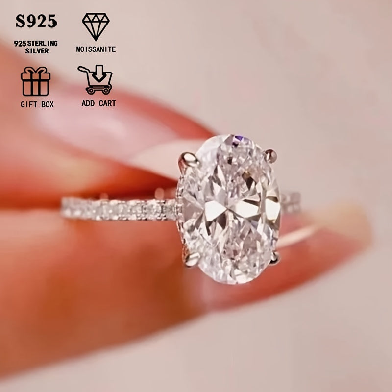 Sterling Silver Oval Moissanite Engagement Ring, featuring an elegant 4-claw pave setting. A timeless women's fashion accessory, ideal for proposals, anniversaries, birthdays, and Mother's Day. Comes in a beautiful gift box.