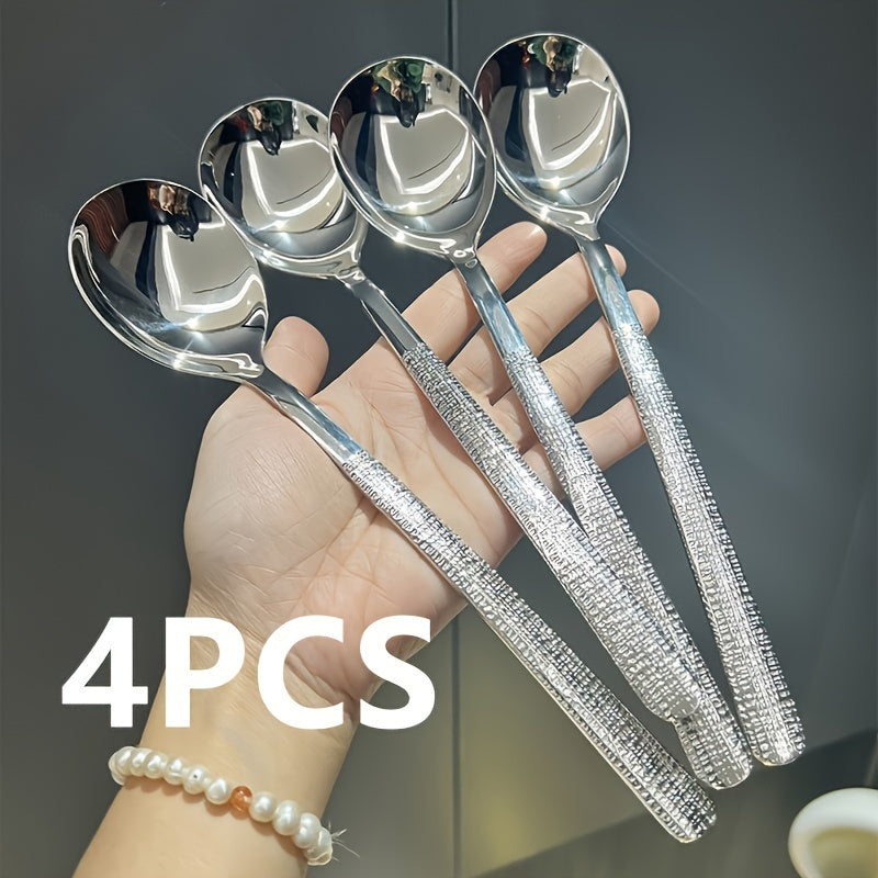 Durable stainless steel spoon with hammered round head design - ideal for kitchen and restaurant use. Easy to clean with a mirror polished finish. Suitable for soups, rice, and desserts.