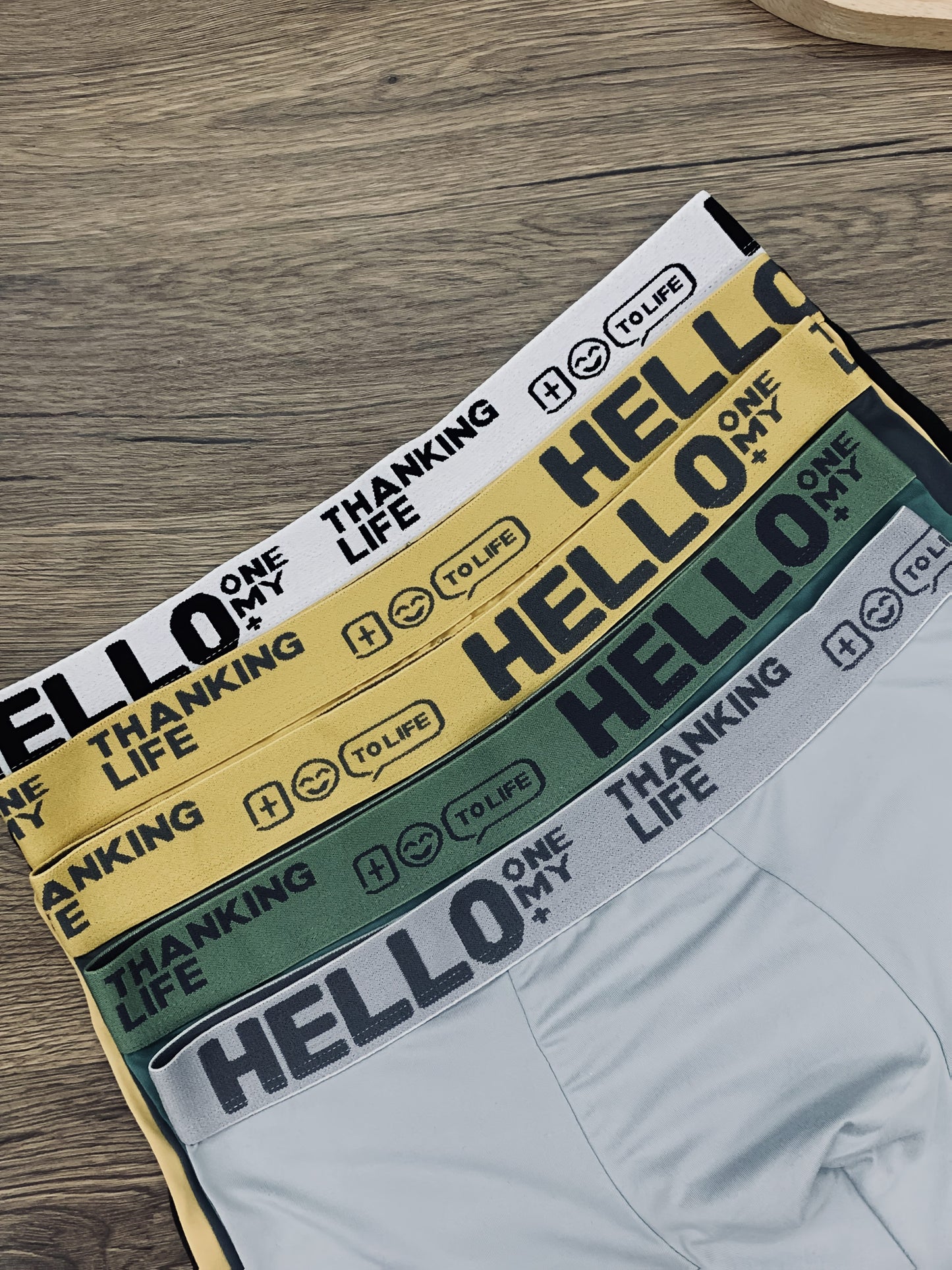 Randomly selected HELLO Men's underwear in 1, 3, or 5 pieces. Solid color square shorts, breathable and comfortable boxers.