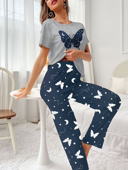 Women's butterfly print pajama set with short sleeve top and elastic pants.