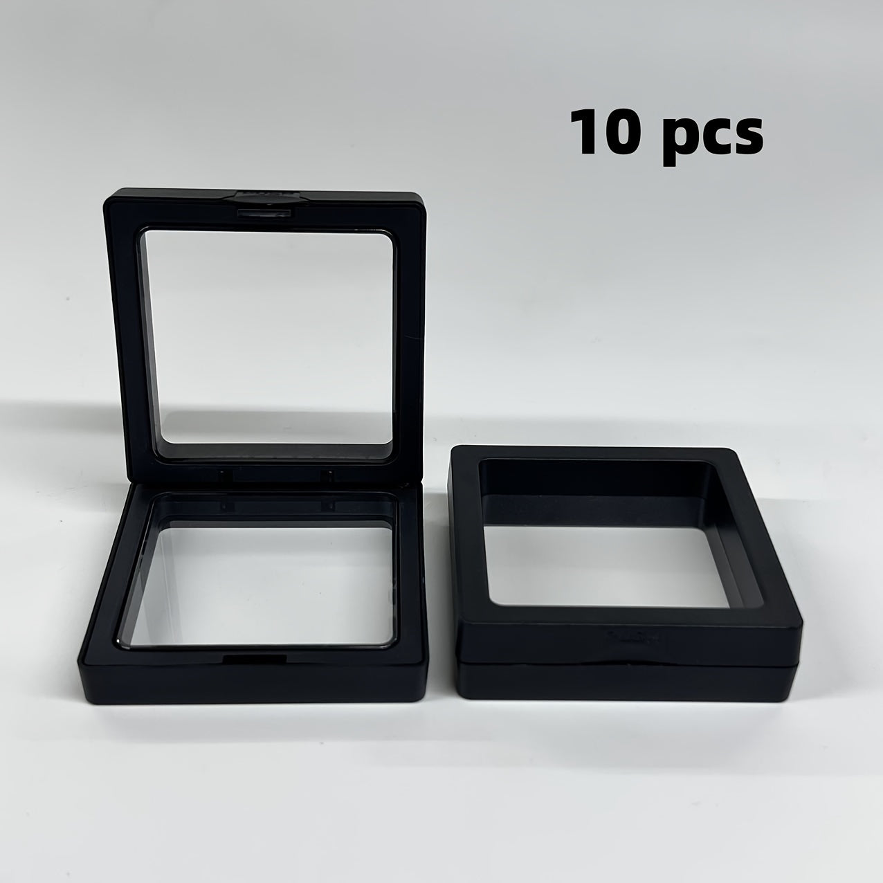 10-pack of floating jewelry boxes for rings, bracelets, earrings, and necklaces.