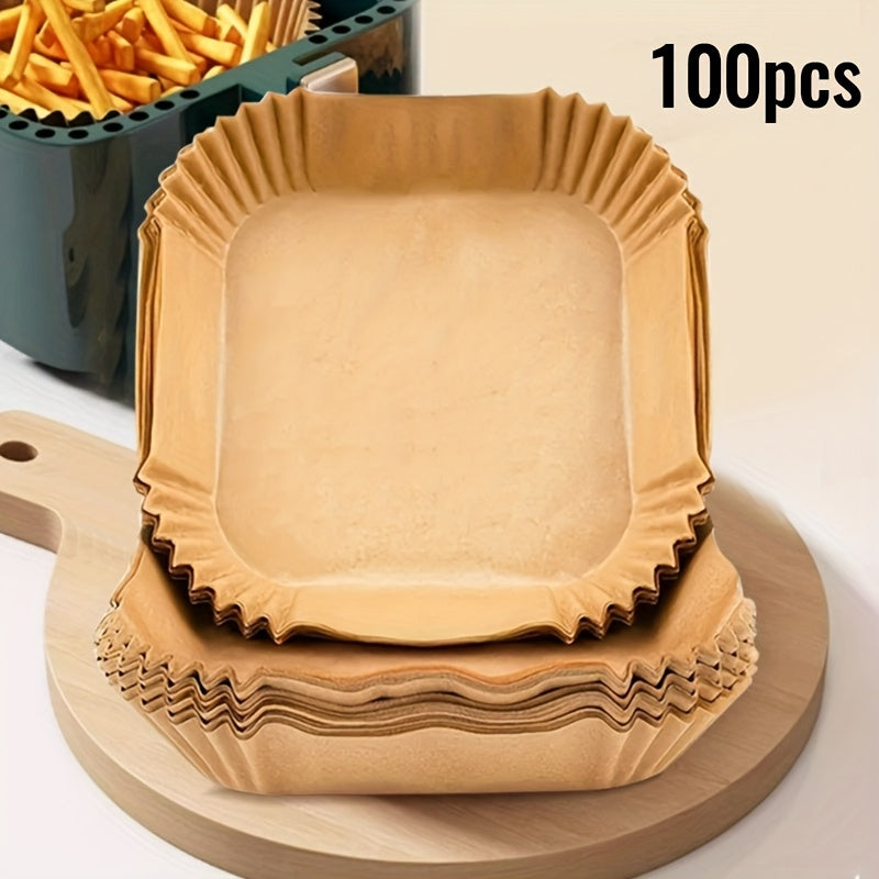 100 pre-cut square liners made of sheepskin paper with non-stick silicone oil are perfect for baking, deep frying, and various kitchen tasks. These food-grade absorbent pads are a must-have for your air fryer.