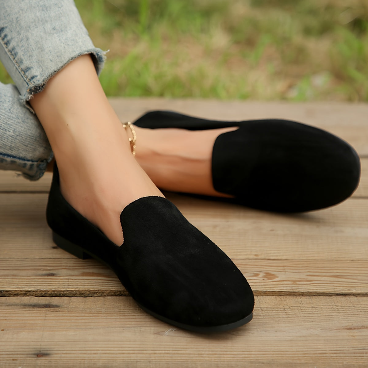 . 

"Black flannel slip-on flats with round toe, lightweight plastic sole, and man-made insole for all-season comfort