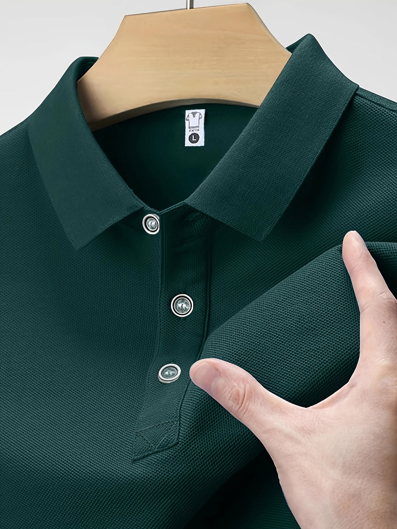 Men's summer casual short sleeve shirt in green, made of 100% polyester knit fabric with slight stretch. Regular fit with solid color lapel collar and button details. 145G/M².