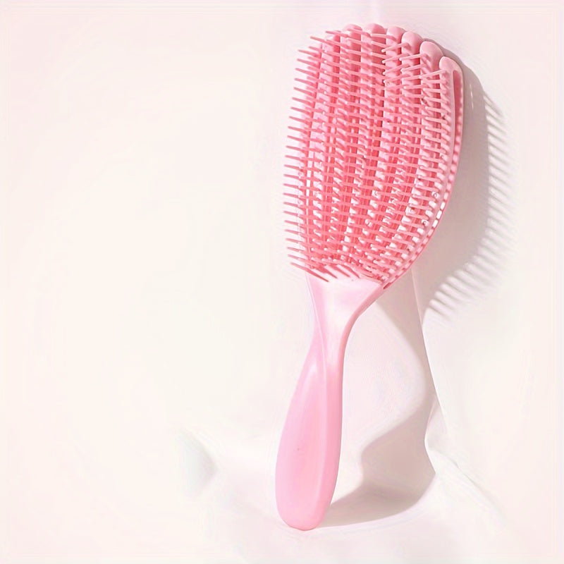 Wet and dry use shell comb with large curved fluffy style for smooth, knot-free hair. Features eight-claw massage design.