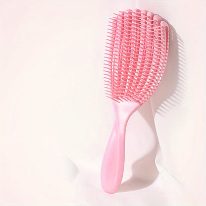 Wet and dry use shell comb with large curved fluffy style for smooth, knot-free hair. Features eight-claw massage design.