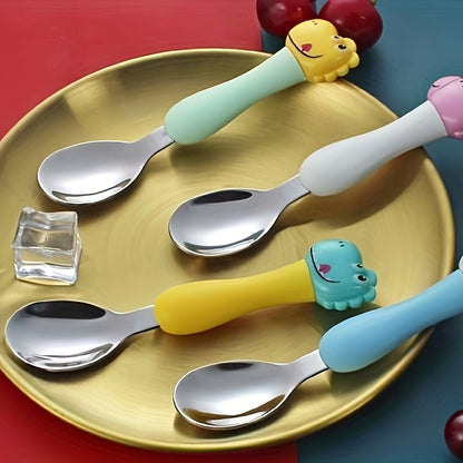 Children's cartoon dinosaur fork and spoon set made of portable 304 stainless steel for learning and training purposes.