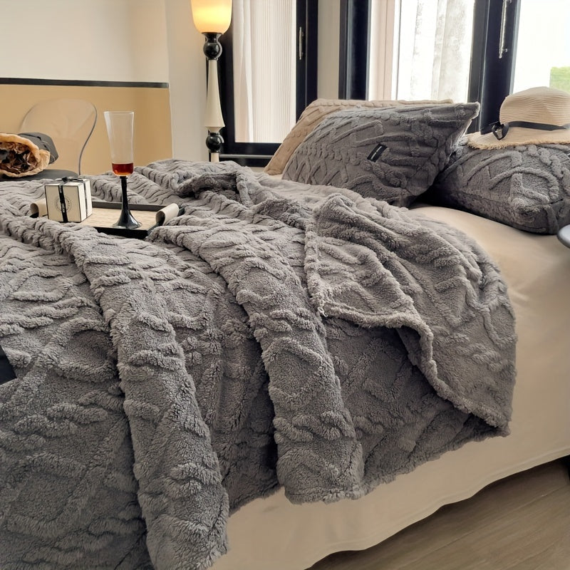 Stay cozy year-round with this modern Jacquard Chenille Bed Blanket. Crafted from soft, warm polyester, it features a striped pattern in mixed colors that adds a touch of style to any room. Machine washable for easy care, this blanket is ideal for the