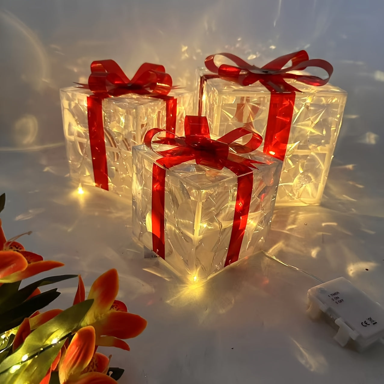 3 Classic LED Lighted Gift Boxes with Red Bows, Battery Operated, Batteries Not Included, Ideal for Holiday Decorations.