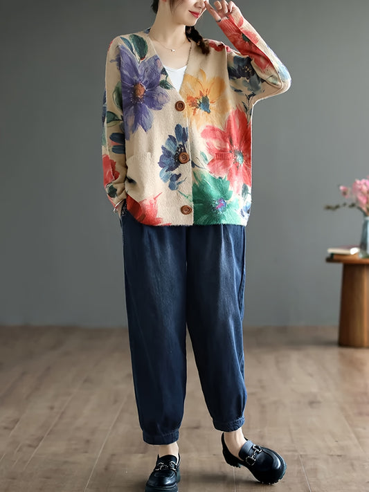 Women's plus size floral pattern button front cardigan with pockets, long sleeves.