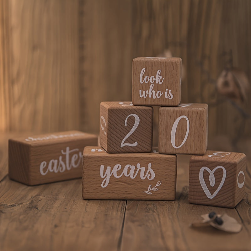 Decorative milestone cubes with printed designs, perfect for capturing growth milestones in photos, ideal for decorating a child's room or commemorating special moments of growth.