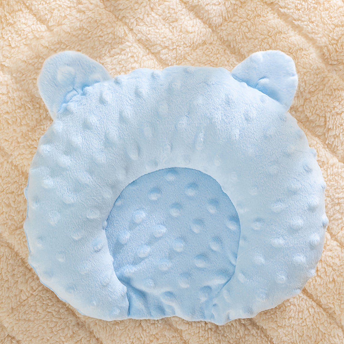 Small dog sleep pad with u-shaped cartoon design. Made of polyester fleece with solid pattern, perfect for toy breeds.