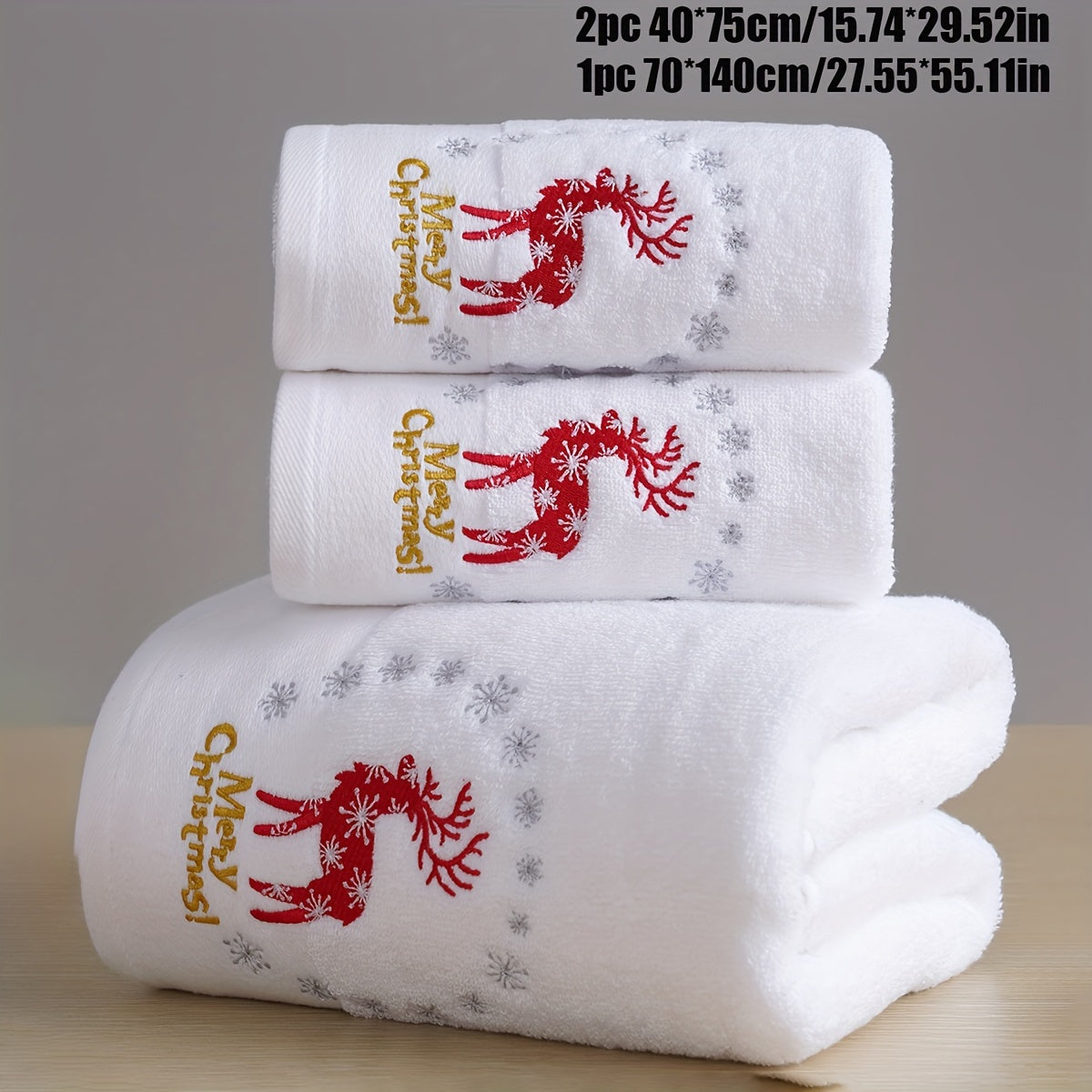 Christmas-themed towel set with embroidered snowman design. Includes 2 towels and 1 bath towel, ideal for couples' bathroom essentials and holiday gifts. Made of 100% cotton.