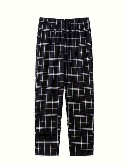 Men's comfortable minimalist style polyester pajama set includes a short sleeve gray tee, black and white checkered long pants with elastic waistband. Machine washable. Relax fit loungewear