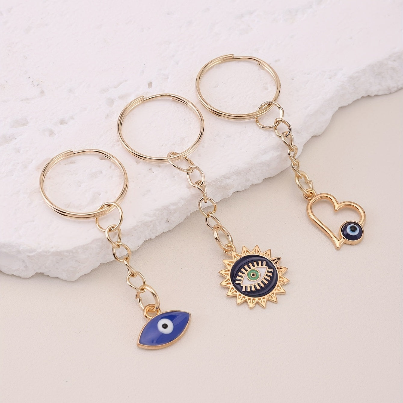 A set of 10 Evil Eye keychain amulets for good luck, perfect for attaching to your keys, purse, bag, backpack, or car keys. These charms also make great party favors or accessories for making jewelry gifts.