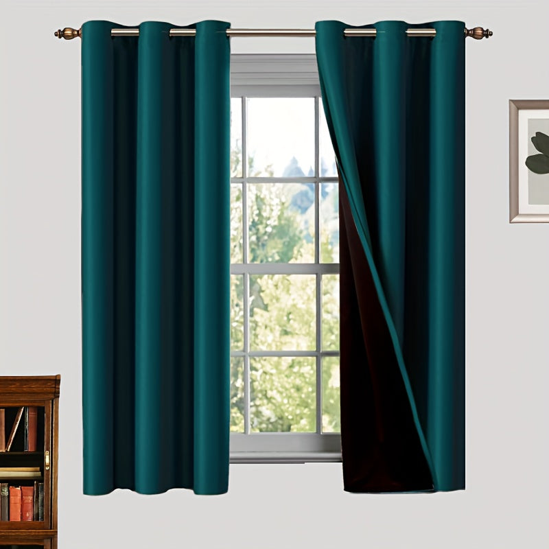 Two pieces of 100% blackout curtains made from polyester, coated and insulated with a grommet top design. Perfect for bedroom, living room, and home decor.