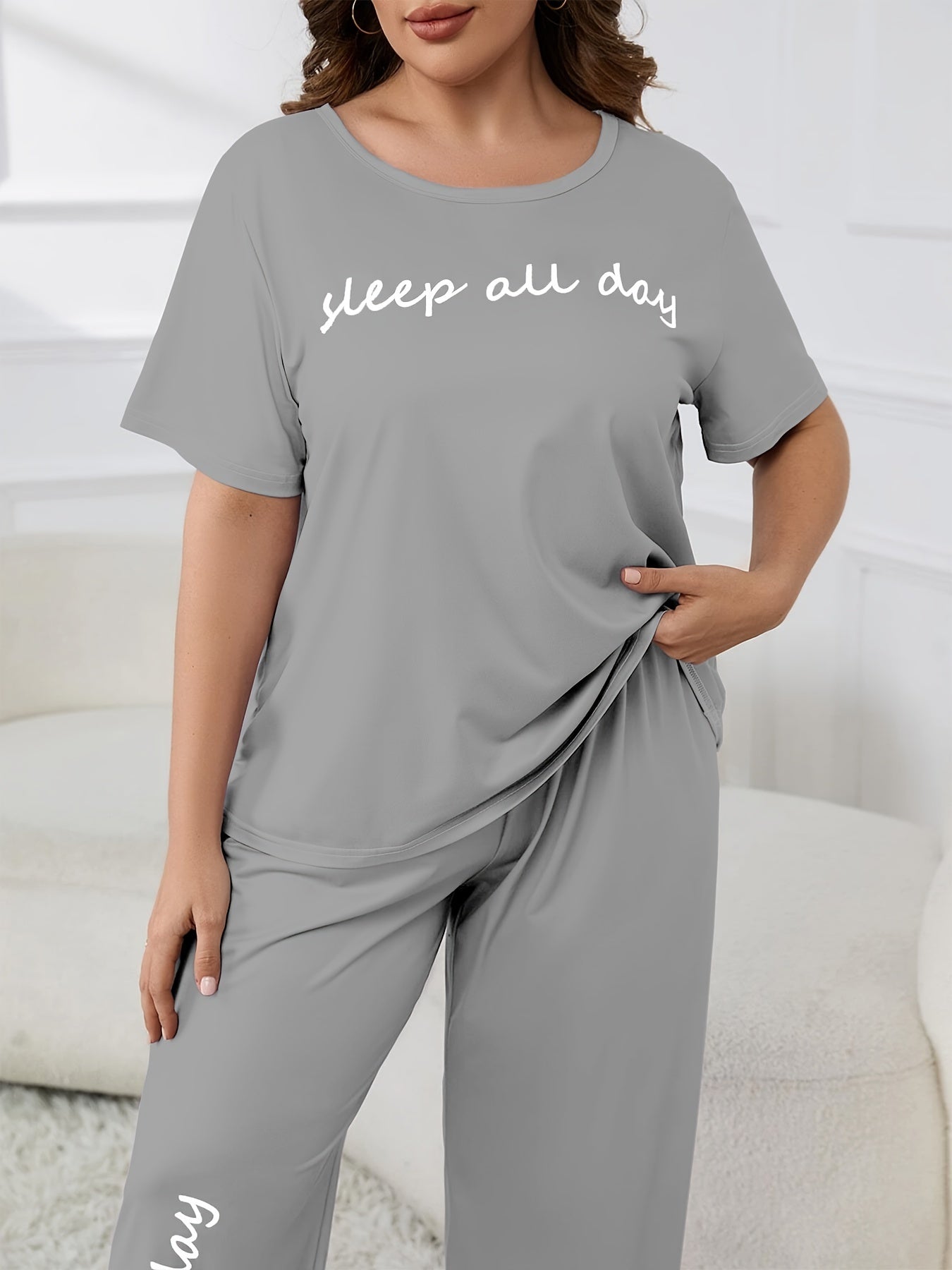 Cute plus-size pajama set with printed top and casual pants.