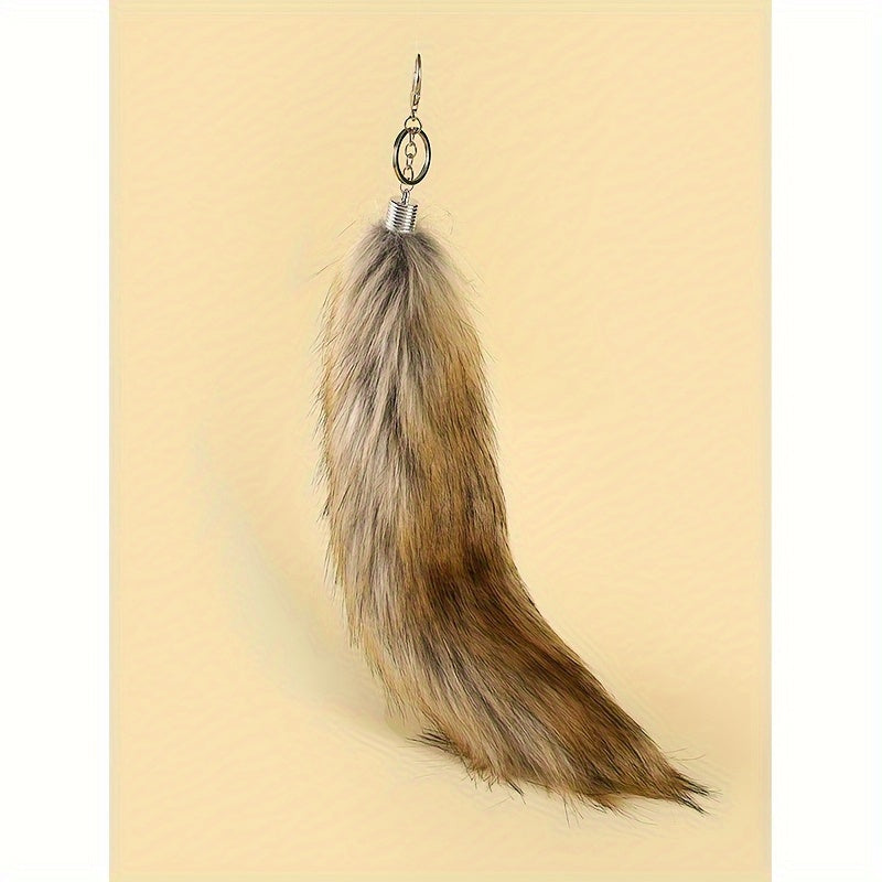 Large Faux Fox Tail Keychain for Women, made with Flannelette Fur and designed as a Carry Bag Keyring. This Novelty Fashion Accessory features a Lobster Claw Closure and is a Decorative Keyring perfect for Birthday Gifts.