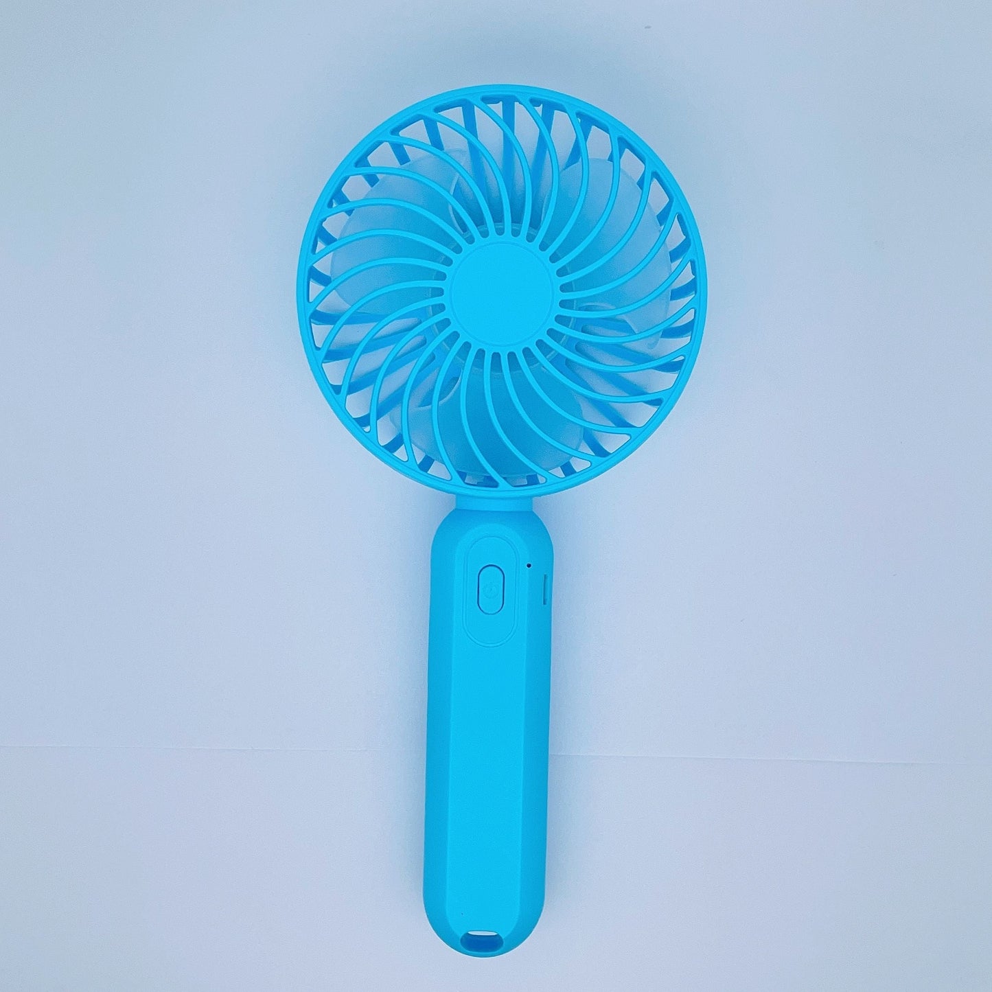 Mini USB Rechargeable Handheld Fan - The perfect portable cooling device for on-the-go use. With a height of 9.06 inches and a base diameter of 3.54 inches, this compact plastic fan is ideal for travel and outdoor activities.