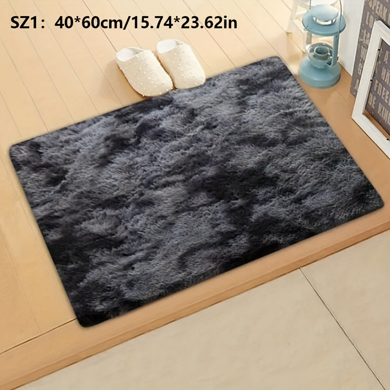 Long fleece carpet in a dark grey tie dye gradient, perfect for the living room coffee table or bedroom decor. This washable mat is fully padded and makes a great Halloween or Christmas gift.