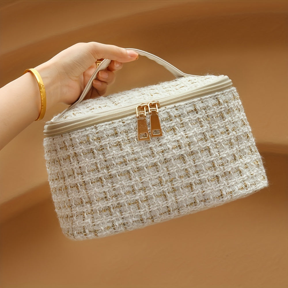 Chic, waterproof cosmetics bag with large capacity and zipper closure for travel or home use.