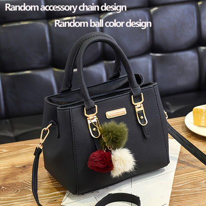 Stylish black handbag with golden-tone hardware and random ball charm, can be used as a versatile shoulder or crossbody bag for women. Ideal for travel, casual outings, and gift giving.