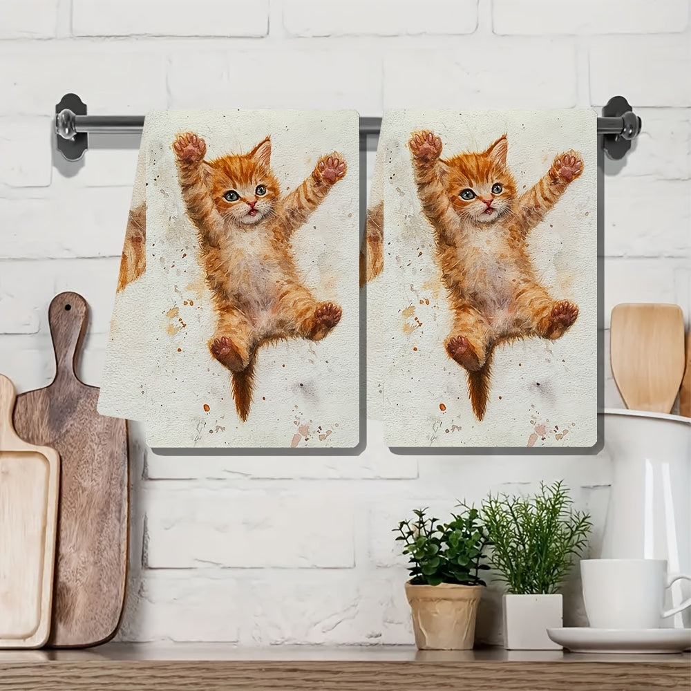 2 pieces of ultra soft kitchen towels featuring an adorable orange kitten learning to jump design. These highly absorbent and machine washable dish hand towels come in a contemporary style measuring 40.64x60.96 cm. Perfect for holiday decor, these dish