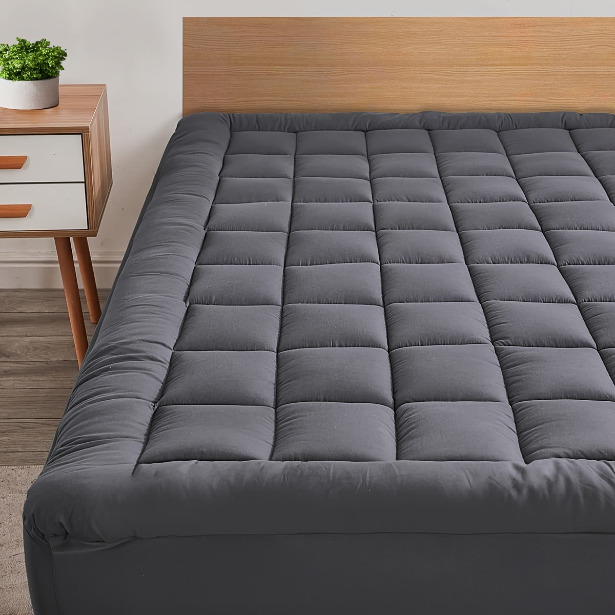 Experience the ultimate comfort with the ALLIFE Luxury Cooling Mattress Pad. This premium quilted topper features breathable and fluffy soft material with 5D spiral fiber fill for added support. The durable deep pocket design can accommodate mattresses