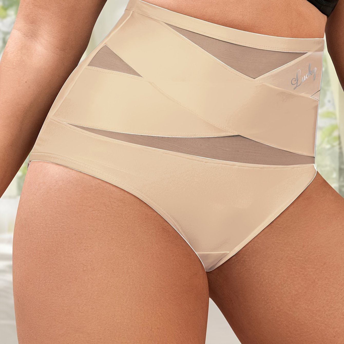 Breathable mesh underwear for plus-size women with high waist and body shaping control, seamless design for sculpting and lifting.