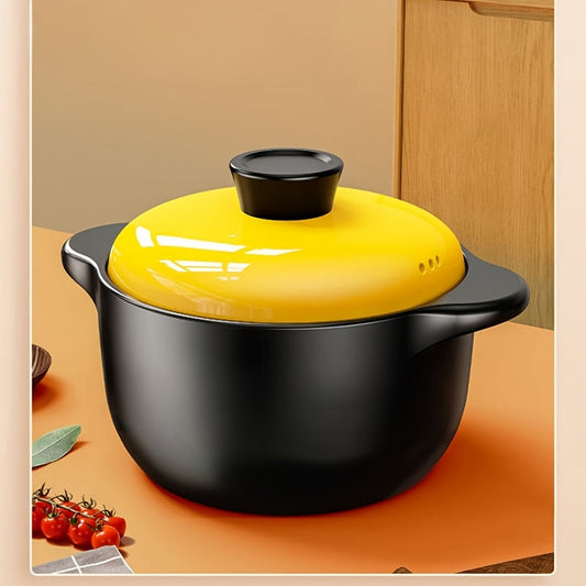 A versatile 5-liter black ceramic stockpot featuring a vibrant yellow lid - perfect for preparing stews, soups, and pot roasts at high temperatures. This multi-functional, heat-resistant, non-stick stockpot is suitable for use on open fires and electric